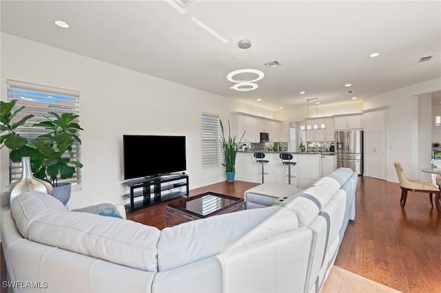 living room featuring wood-type flooring