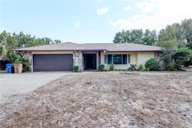 ranch-style home with a garage