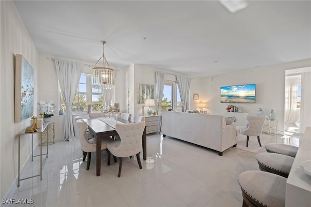 dining area with a notable chandelier