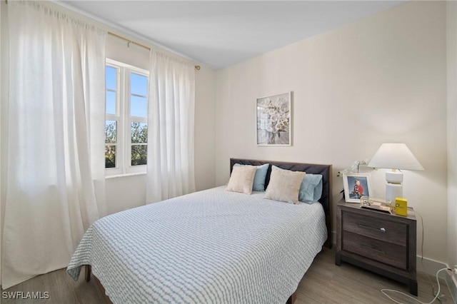 bedroom featuring hardwood / wood-style flooring