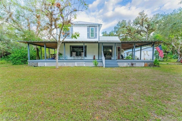 back of house featuring a yard