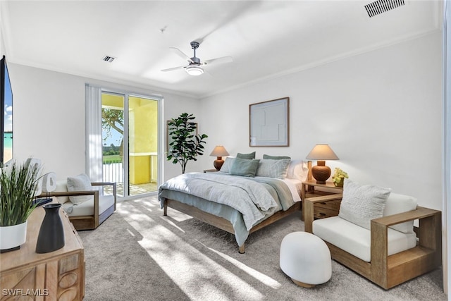 carpeted bedroom with ornamental molding, access to exterior, and ceiling fan