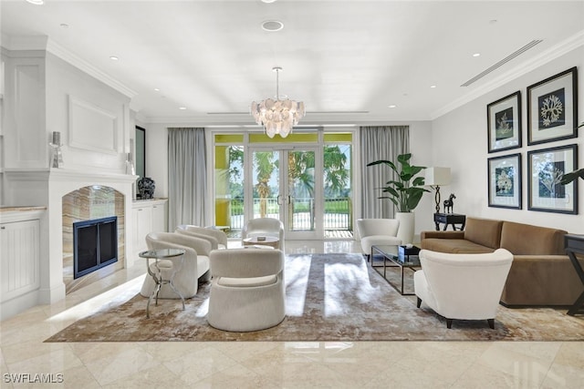 living room featuring a premium fireplace, ornamental molding, an inviting chandelier, and french doors