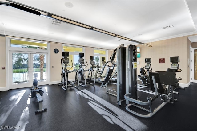 exercise room with crown molding and french doors