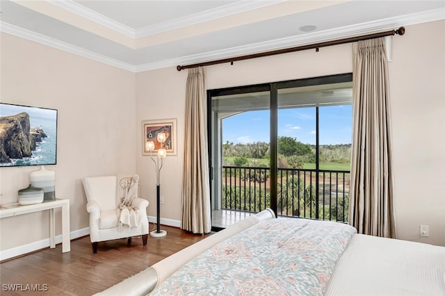 bedroom featuring crown molding, dark hardwood / wood-style floors, and access to exterior