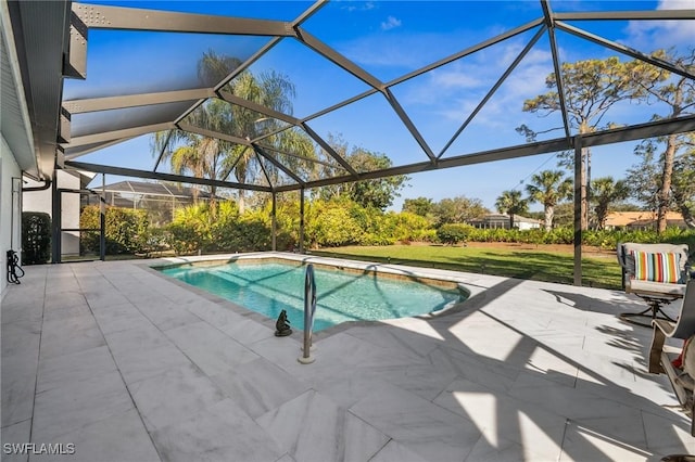 outdoor pool with a patio, a lawn, and a lanai