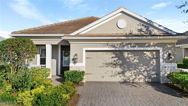 view of front of home with a garage