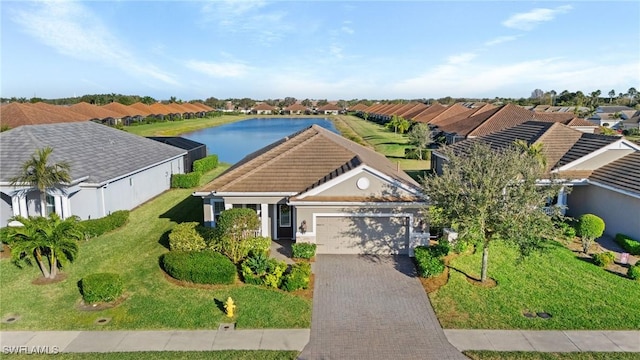 bird's eye view with a water view