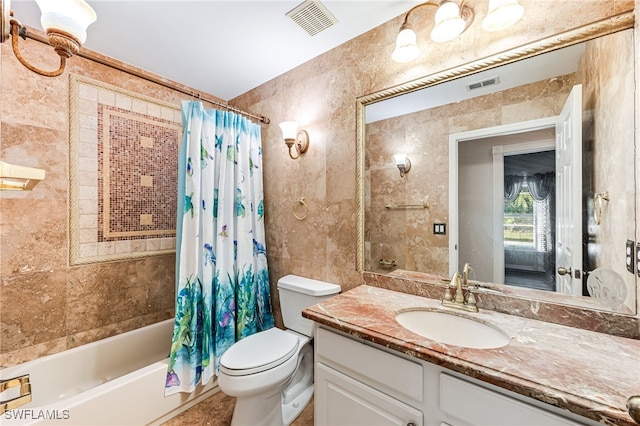 full bathroom featuring vanity, toilet, shower / bath combination with curtain, and tile walls