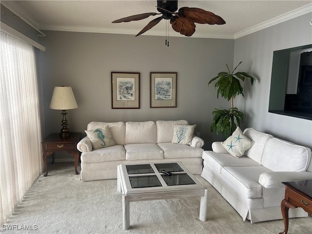 living room featuring crown molding, light colored carpet, and ceiling fan