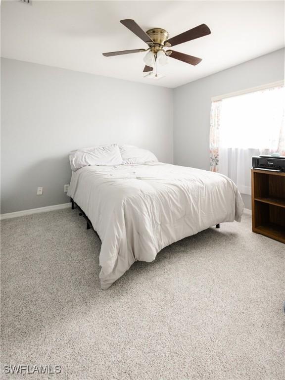 bedroom featuring carpet floors and ceiling fan