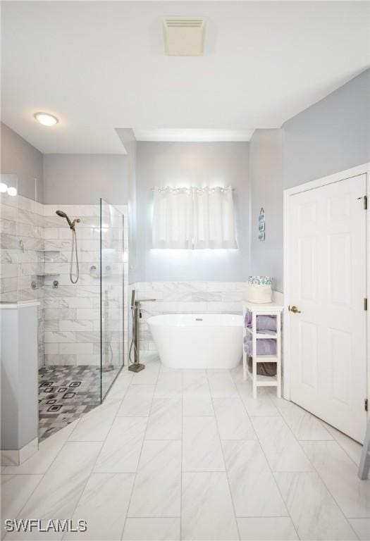 bathroom featuring tile walls and plus walk in shower