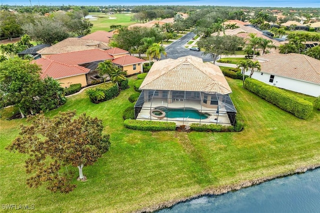 drone / aerial view with a water view