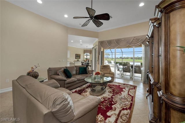 living room featuring light tile patterned floors, ornamental molding, and ceiling fan