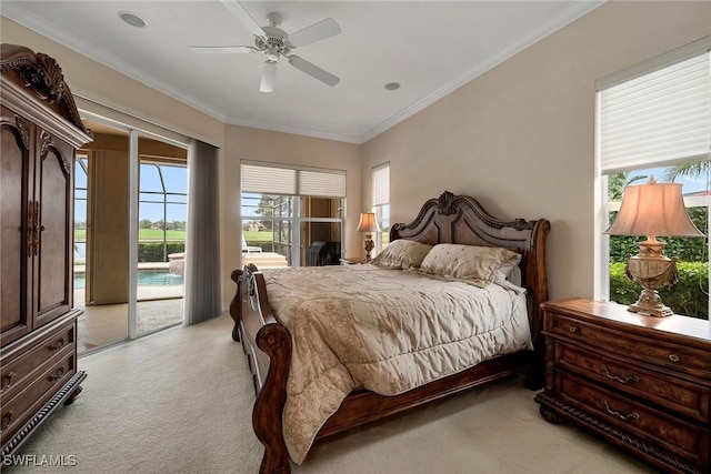 carpeted bedroom with ceiling fan, ornamental molding, and access to outside