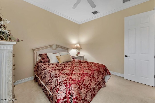 bedroom featuring ornamental molding, light carpet, and ceiling fan