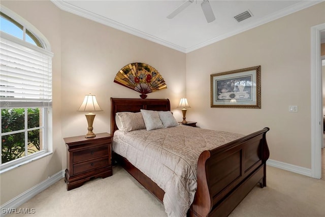 carpeted bedroom featuring multiple windows, crown molding, and ceiling fan