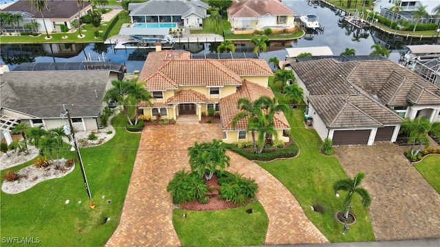 drone / aerial view with a water view