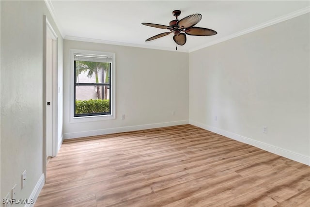 unfurnished room with ceiling fan, ornamental molding, and light wood-type flooring