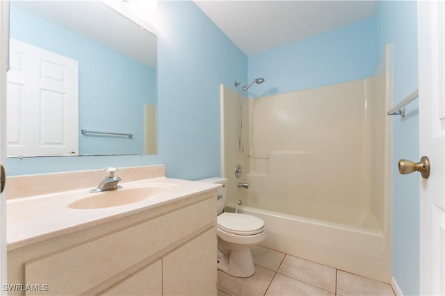 full bath with toilet, washtub / shower combination, vanity, and tile patterned floors