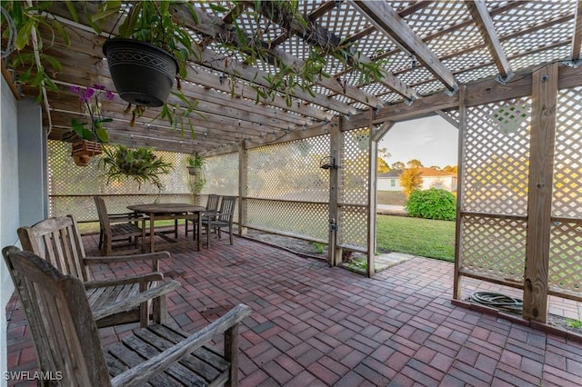 view of patio / terrace featuring outdoor dining area and a pergola