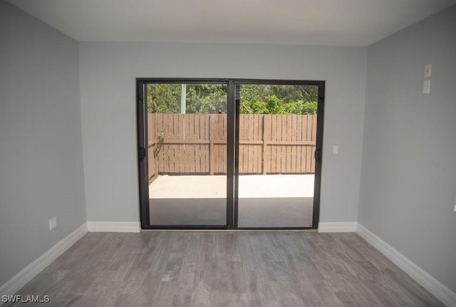 17291 Timber Oak Ln, Fort Myers, FL 33908 - unfurnished room featuring light wood-type flooring