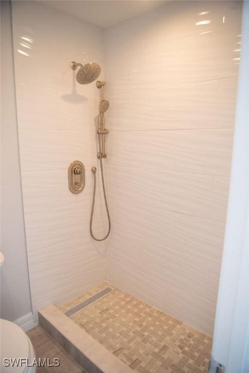 17291 Timber Oak Ln, Fort Myers, FL 33908 - bathroom with tiled shower and toilet