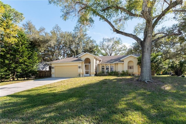 ranch-style home with a garage and a front lawn