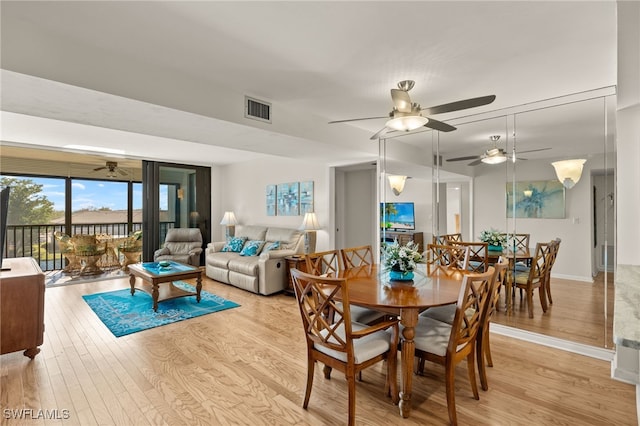 dining room with light hardwood / wood-style floors