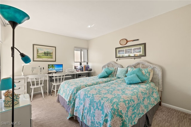 bedroom featuring light colored carpet