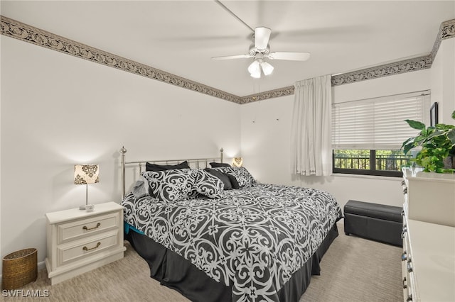 bedroom with light colored carpet and ceiling fan