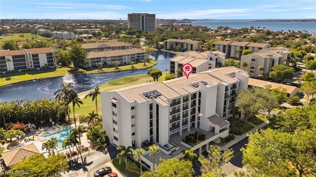 bird's eye view with a water view