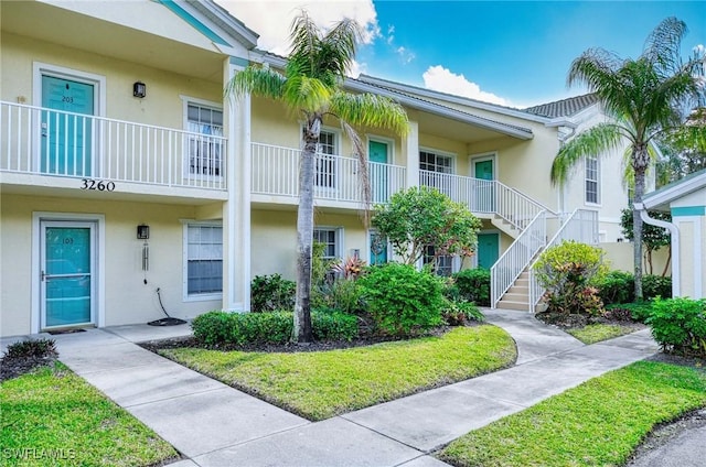 3260 Douglas Dr Unit 204, Naples, FL 34105 - view of building exterior with stairs