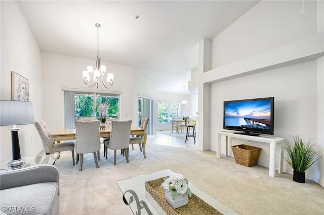 3260 Douglas Dr Unit 204, Naples, FL 34105 - carpeted dining space with a notable chandelier