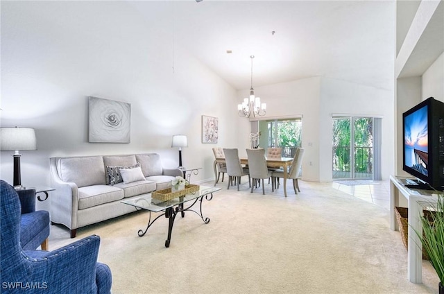 3260 Douglas Dr Unit 204, Naples, FL 34105 - carpeted living area with an inviting chandelier, high vaulted ceiling, and baseboards