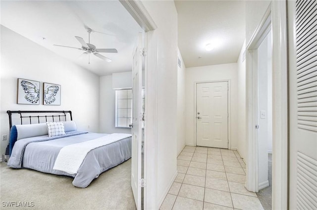 3260 Douglas Dr Unit 204, Naples, FL 34105 - bedroom with light tile patterned flooring, visible vents, ceiling fan, and baseboards