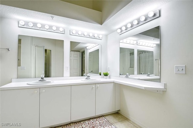 3260 Douglas Dr Unit 204, Naples, FL 34105 - full bathroom featuring double vanity, a sink, and tile patterned floors
