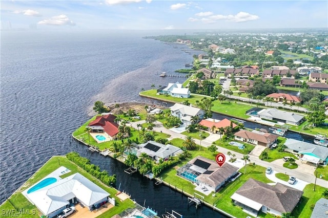 aerial view featuring a water view