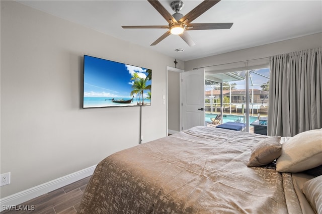 bedroom featuring ceiling fan, access to exterior, and dark hardwood / wood-style flooring