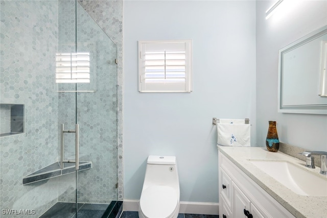 bathroom featuring walk in shower, vanity, and toilet