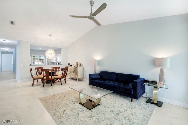 living room featuring vaulted ceiling and ceiling fan