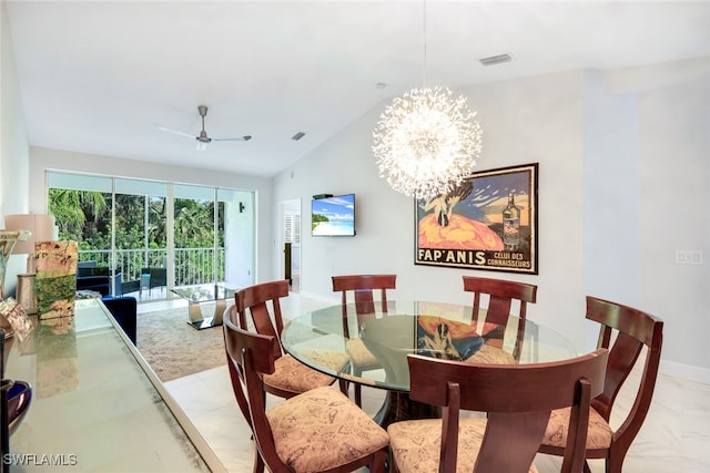 dining space with ceiling fan with notable chandelier