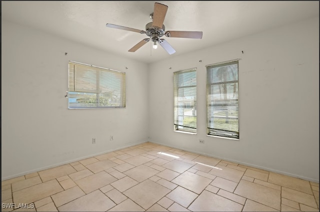 spare room featuring ceiling fan