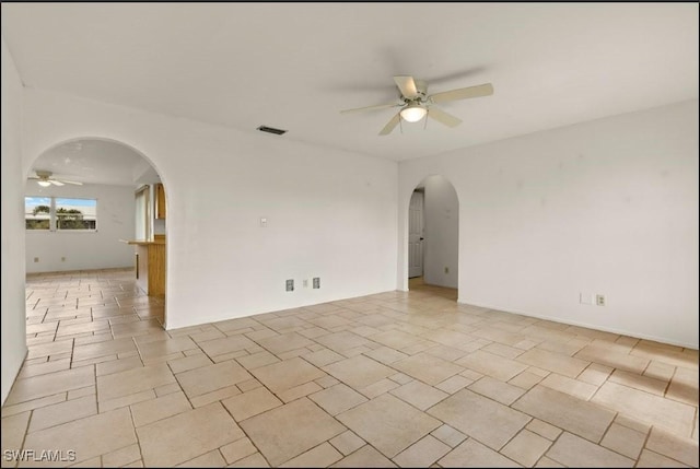 empty room featuring ceiling fan