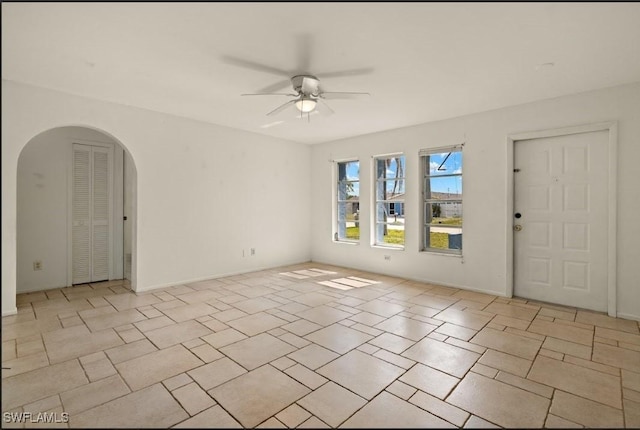 spare room featuring ceiling fan