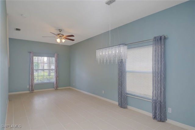 spare room featuring ceiling fan