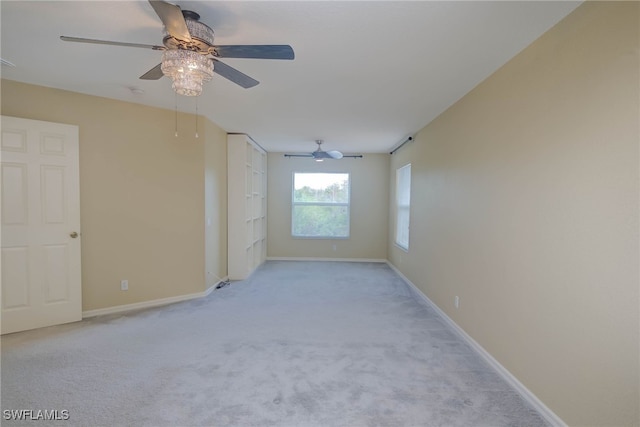 empty room with light colored carpet