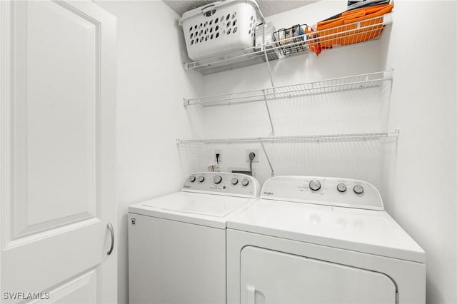 laundry area featuring separate washer and dryer