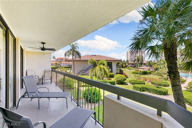 balcony featuring ceiling fan