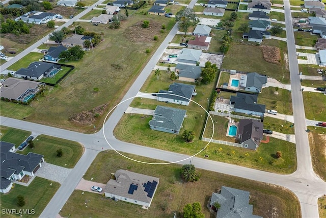 birds eye view of property featuring a residential view